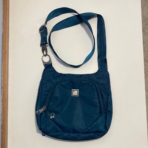 LEWIS N. CLARK Anti-theft purse. Blue